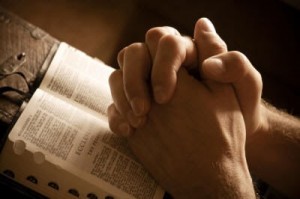 Bible praying hands